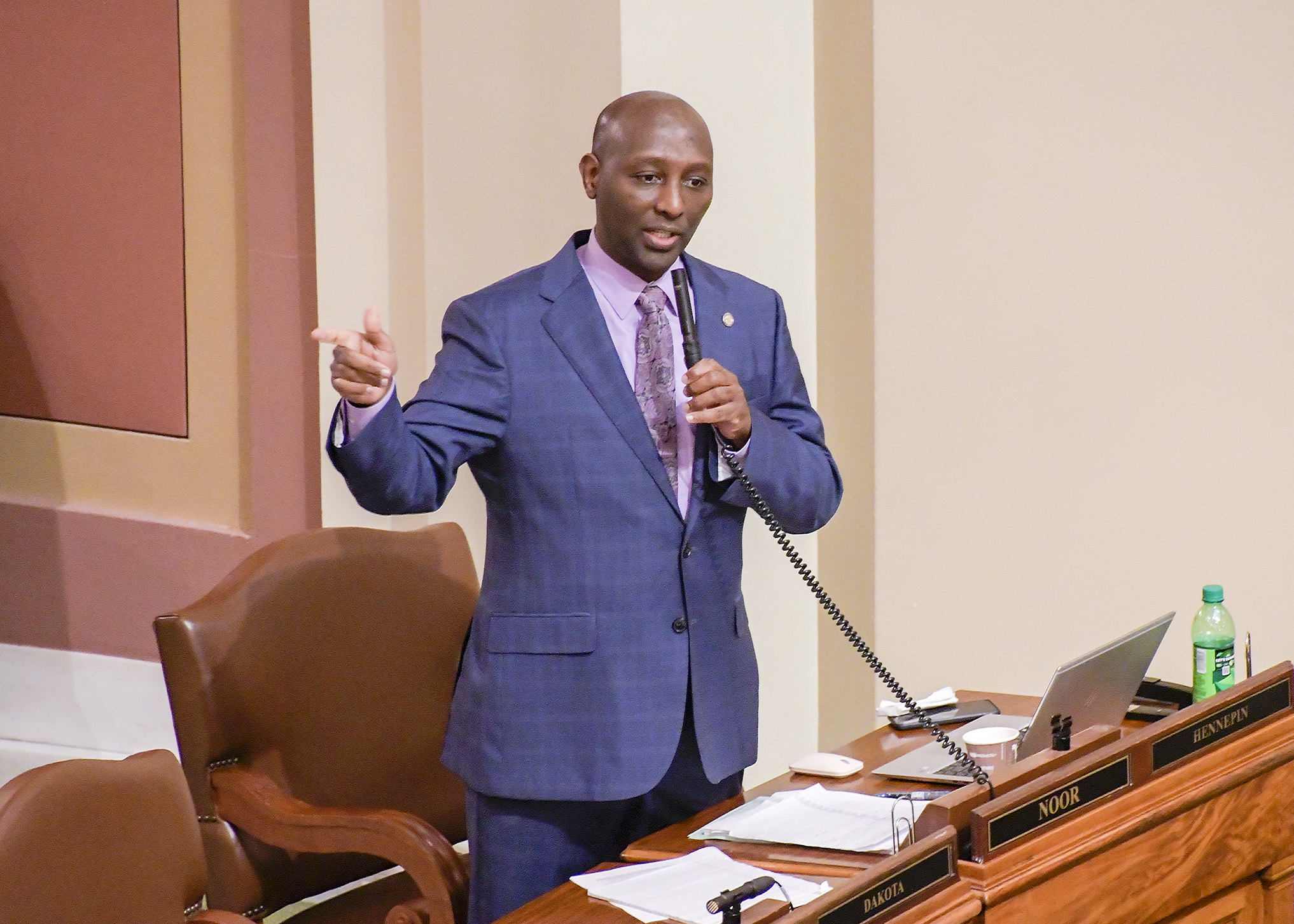 Rep. Mohamud Noor presents the omnibus workforce and business development finance and policy bill Friday. Photo by Andrew VonBank